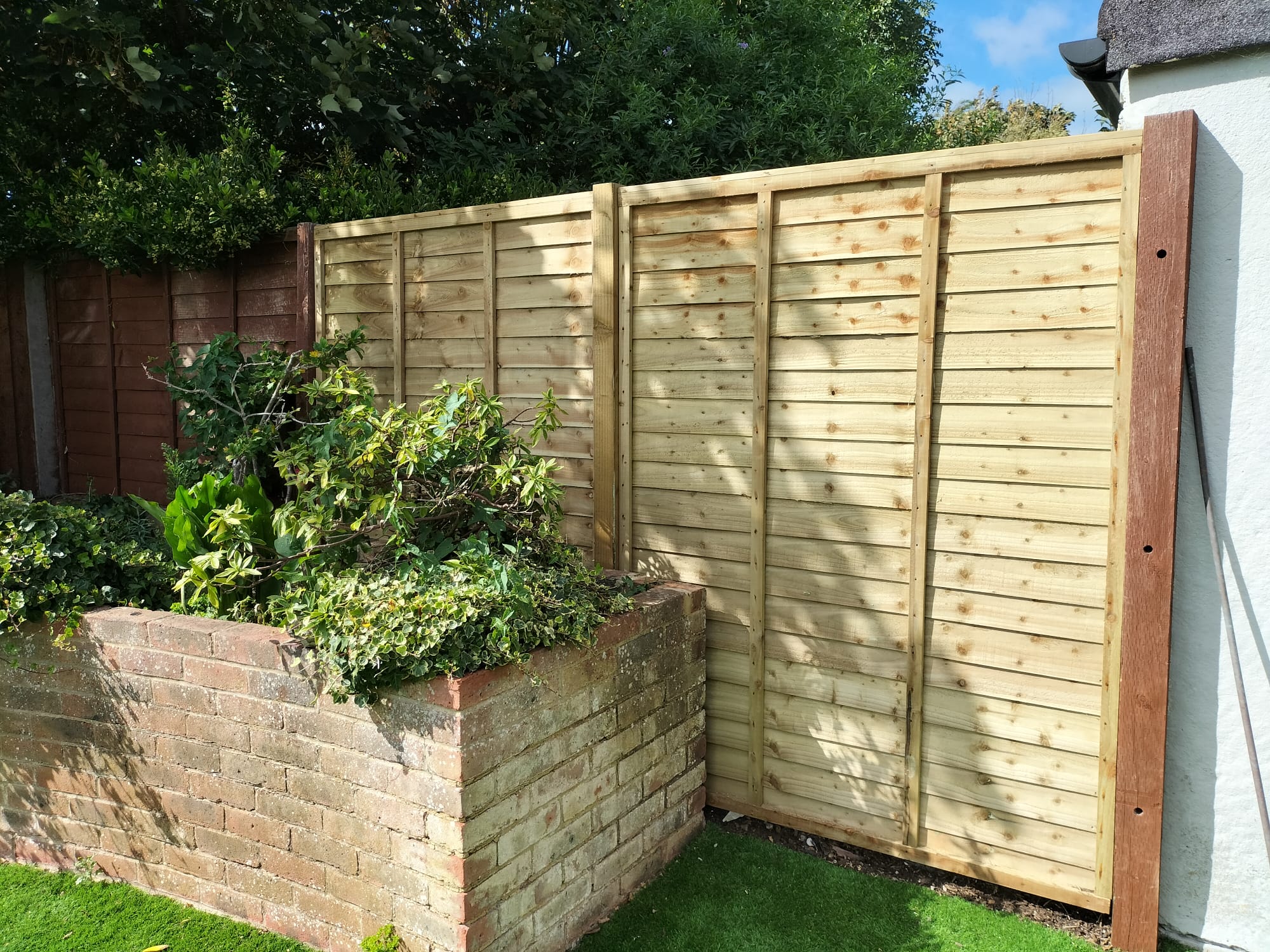 Larch Lap Fence With Wooden Posts